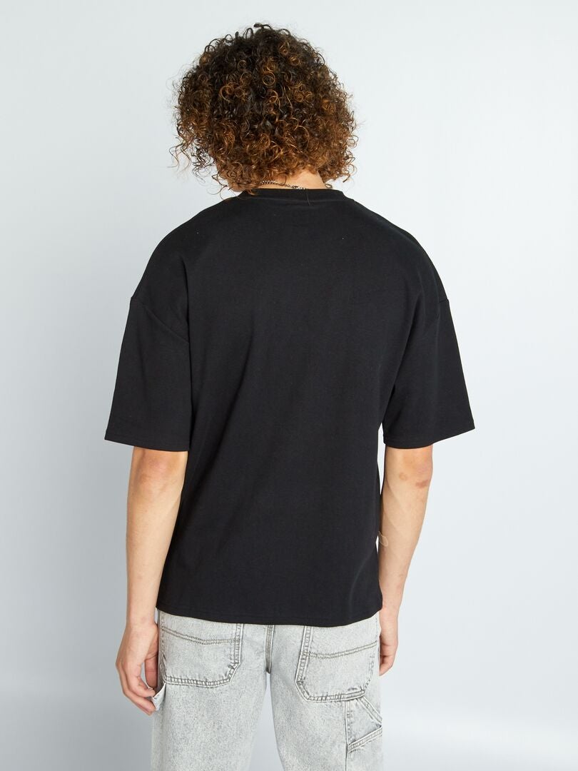 T-shirt scollo tondo con tasca sul petto Nero - Kiabi