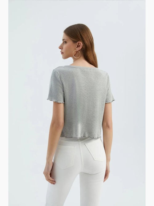 T-shirt scollo v strutturata manica corta hiccup - Kiabi T-shirt scollo v strutturata manica corta hiccup - Kiabi