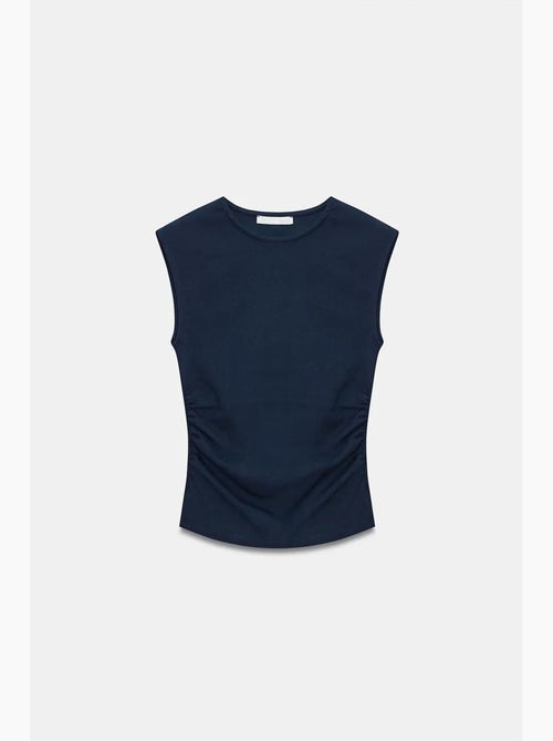T-shirt senza maniche a costine con girocollo, slim fit dilvin - Kiabi T-shirt senza maniche a costine con girocollo, slim fit dilvin - Kiabi