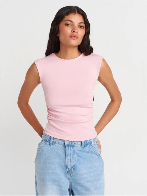 T-shirt senza maniche a costine con girocollo, slim fit dilvin - Kiabi T-shirt senza maniche a costine con girocollo, slim fit dilvin - Kiabi