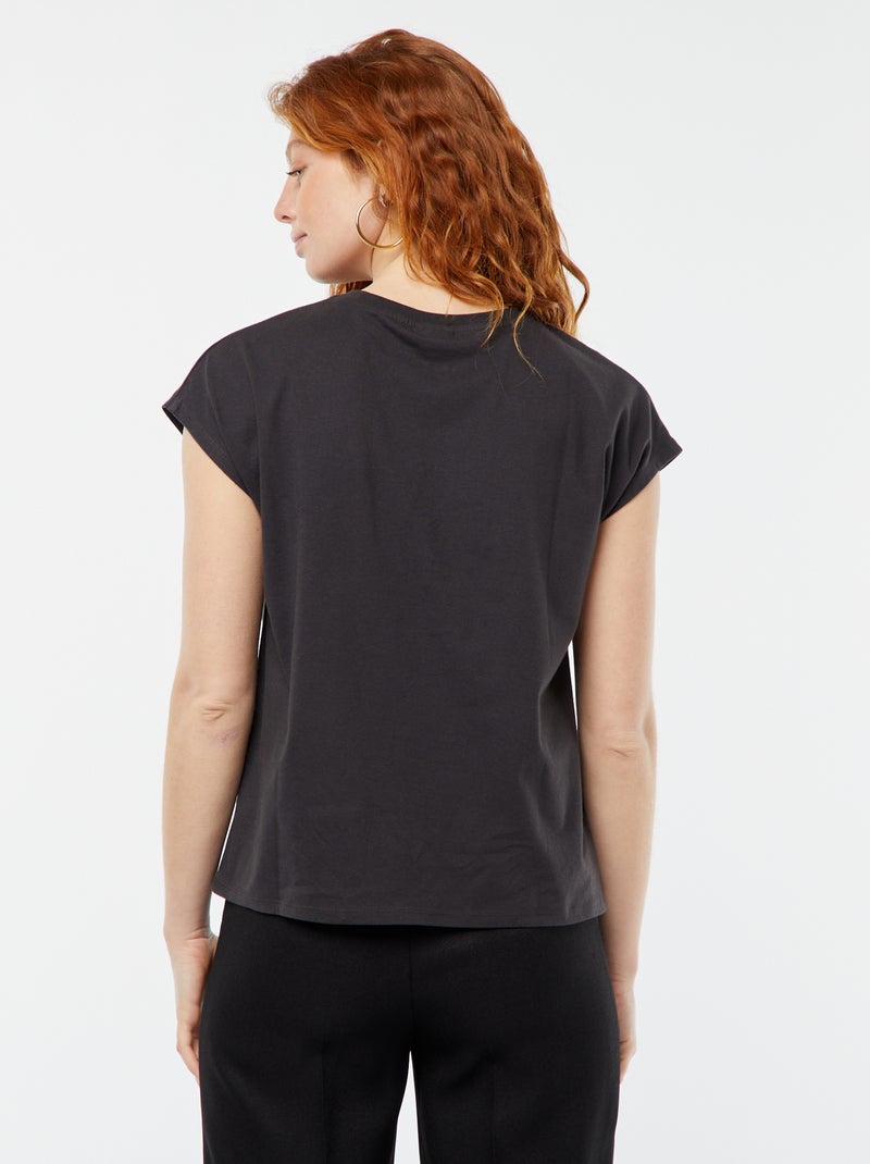 T-shirt senza maniche 'Disney' NERO - Kiabi