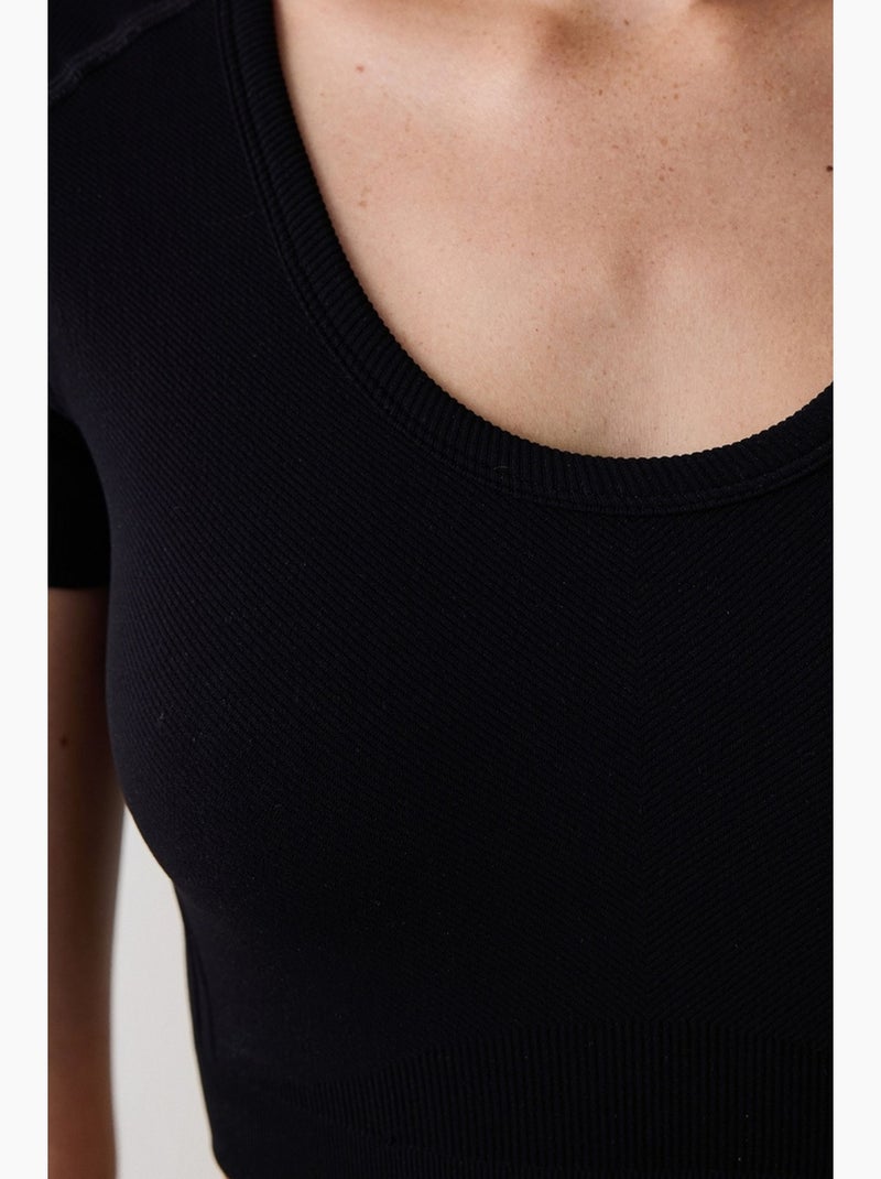 T-shirt sportiva corta manica corta senza cuciture aderente penti Nero - Kiabi