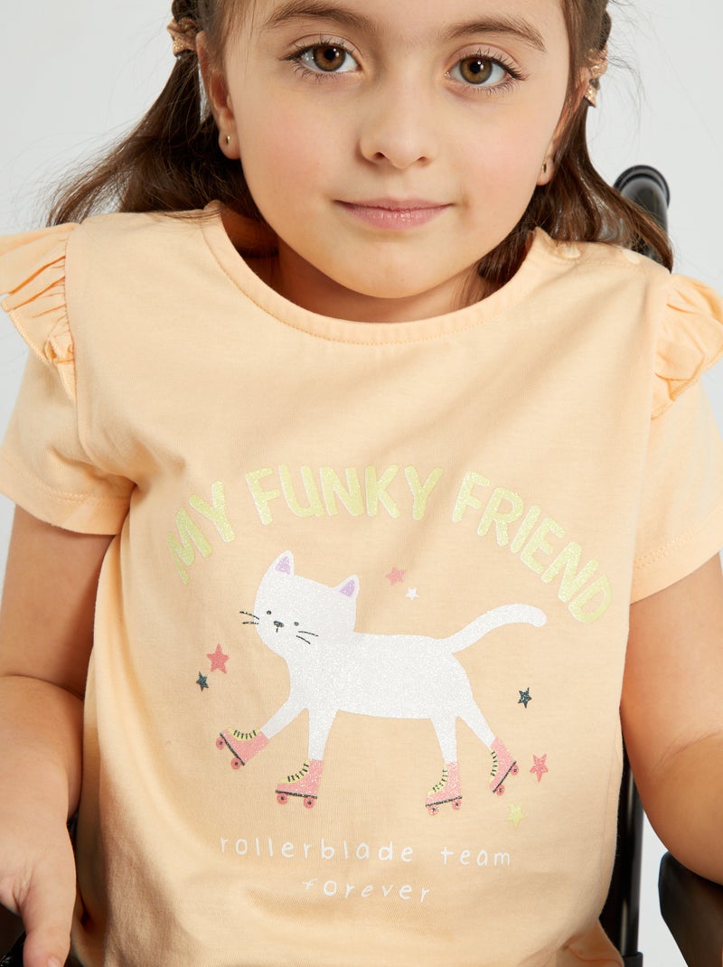 T-shirt stampata con bottoni a pressione sulle spalle ARANCIONE - Kiabi