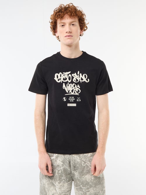 T-shirt stampata con motivo piazzato in cotone tinta unita - Kiabi T-shirt stampata con motivo piazzato in cotone tinta unita - Kiabi