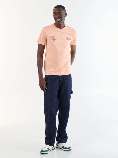 T-shirt stampata fantasia a maniche corte - Kiabi T-shirt stampata fantasia a maniche corte - Kiabi