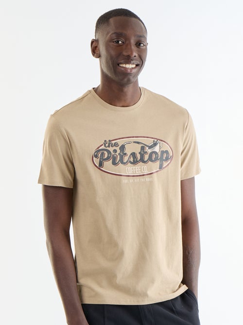 T-shirt stampata fantasia a maniche corte - Kiabi T-shirt stampata fantasia a maniche corte - Kiabi