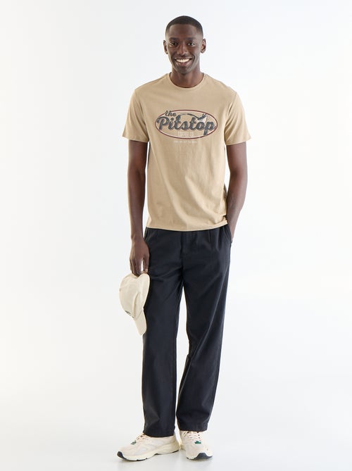 T-shirt stampata fantasia a maniche corte - Kiabi T-shirt stampata fantasia a maniche corte - Kiabi