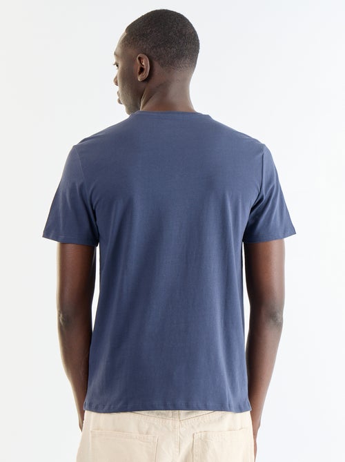 T-shirt stampata fantasia a maniche corte - Kiabi T-shirt stampata fantasia a maniche corte - Kiabi