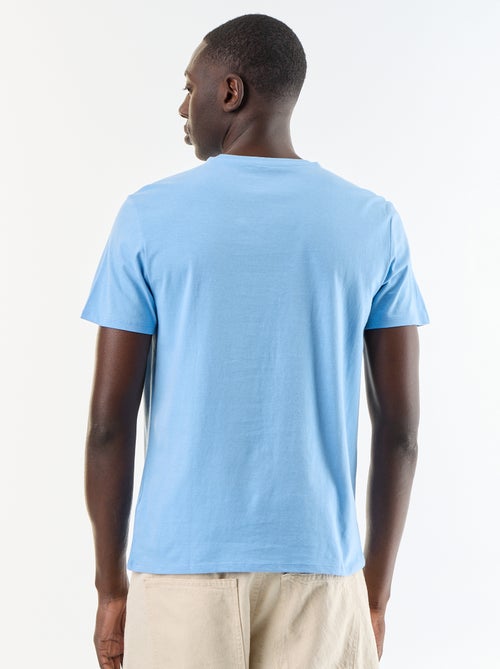 T-shirt stampata fantasia a maniche corte - Kiabi T-shirt stampata fantasia a maniche corte - Kiabi