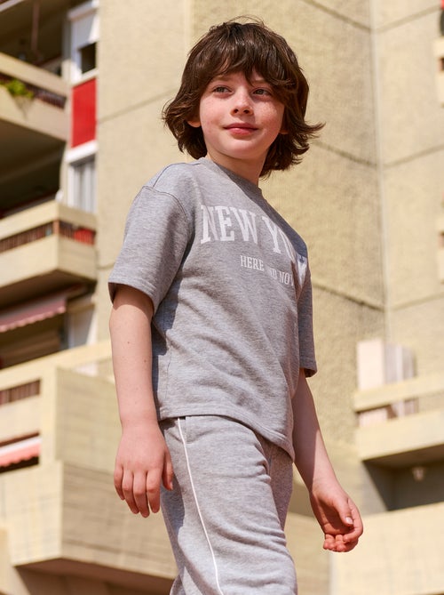 T-shirt stile universitario a maniche corte - Kiabi