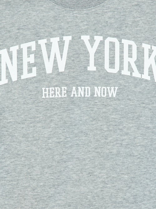 T-shirt stile universitario a maniche corte - Kiabi