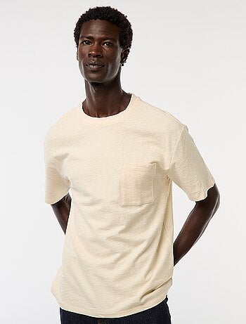 T-shirt tinta unita a maniche corte con tasca sul petto