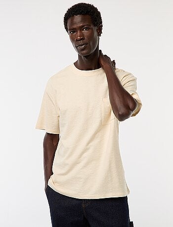 T-shirt tinta unita a maniche corte con tasca sul petto