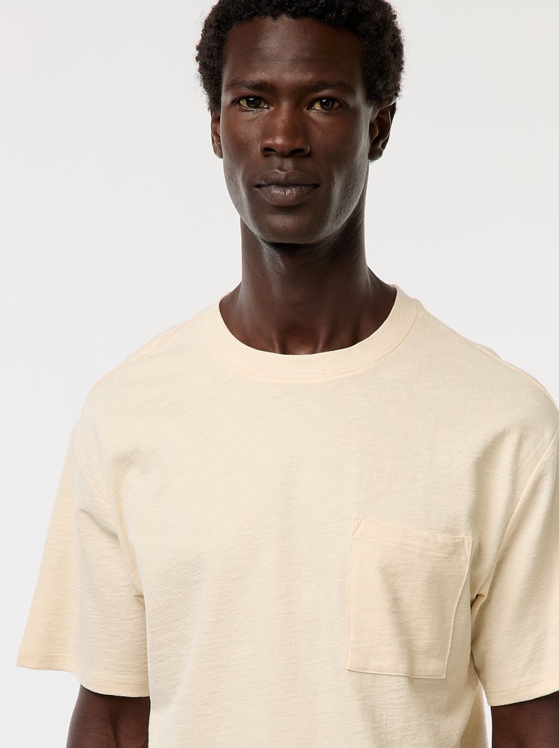 T-shirt tinta unita a maniche corte con tasca sul petto Bianco - Kiabi