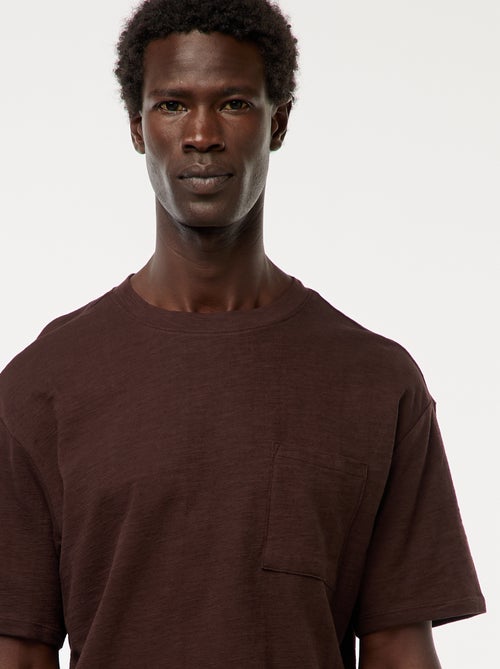 T-shirt tinta unita a maniche corte con tasca sul petto - Kiabi