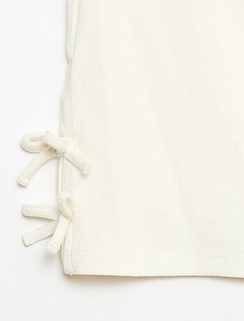 T-shirt tinta unita con fiocchi decorativi