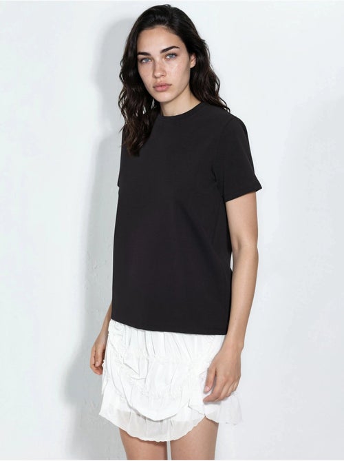 T-shirt tinta unita con girocollo busem - Kiabi T-shirt tinta unita con girocollo busem - Kiabi