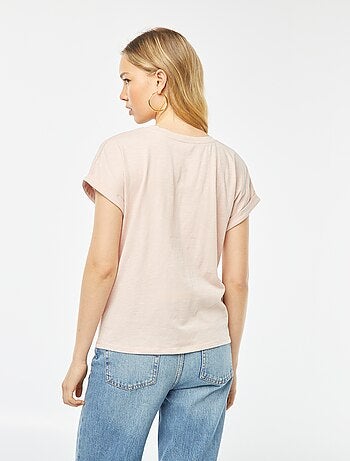 T-shirt tinta unita con scollo tondo e maniche corte con risvolti