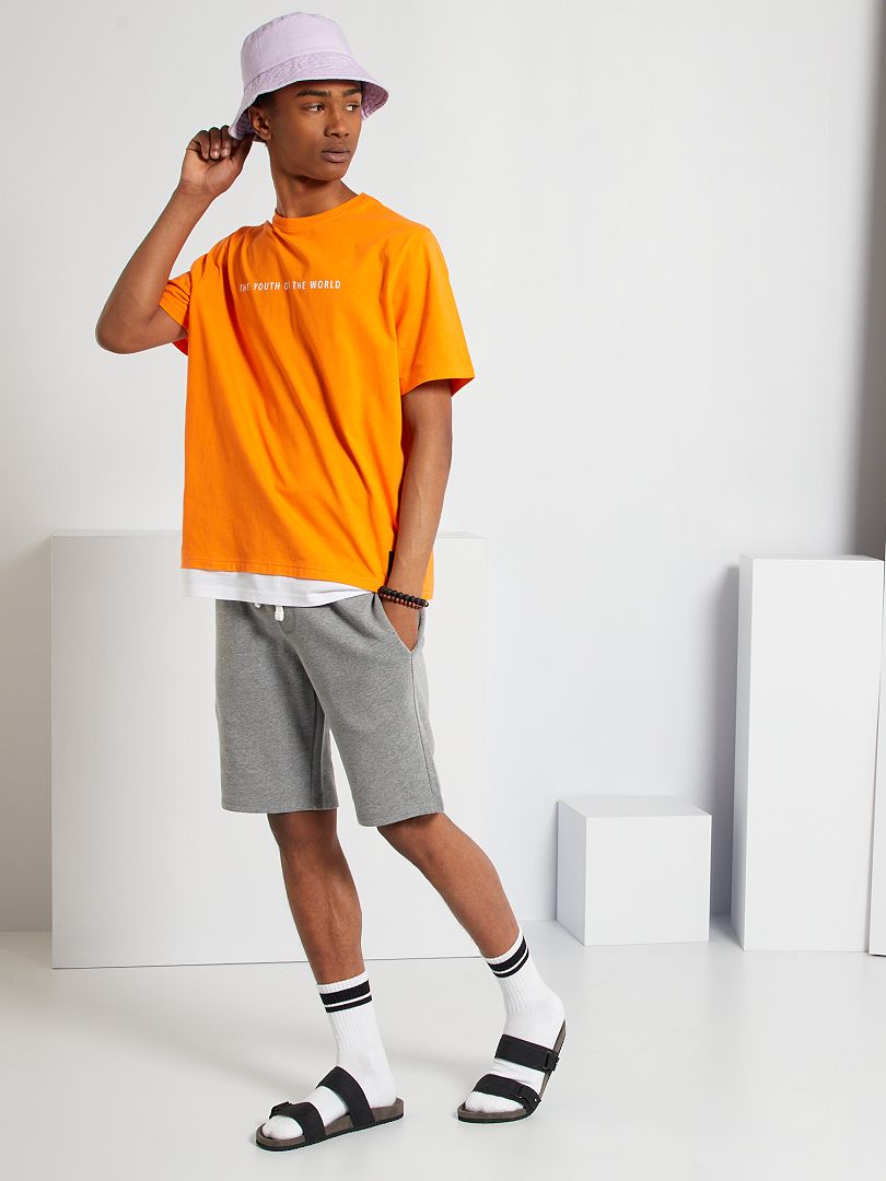T-shirt 'world vibes' arancio - Kiabi
