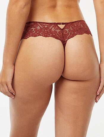 Tanga in pizzo trasparente con gioiello fantasia