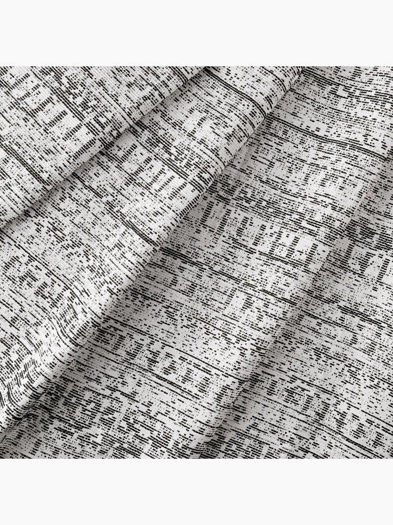 Tenda jacquard testurizzata d'ispirazione minerale con occhielli Nero - Kiabi