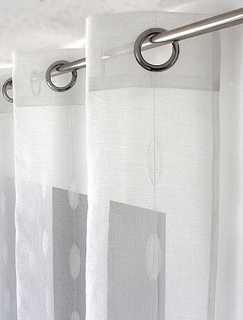 Tenda trasparente jacquard con pois ovali e occhielli
