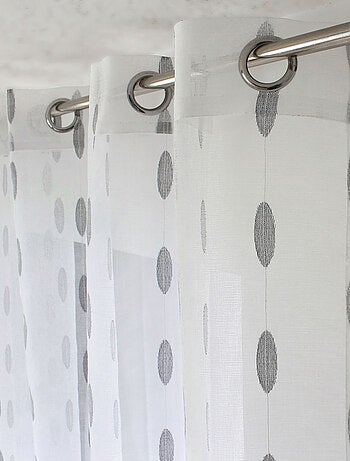 Tenda trasparente jacquard con pois ovali e occhielli
