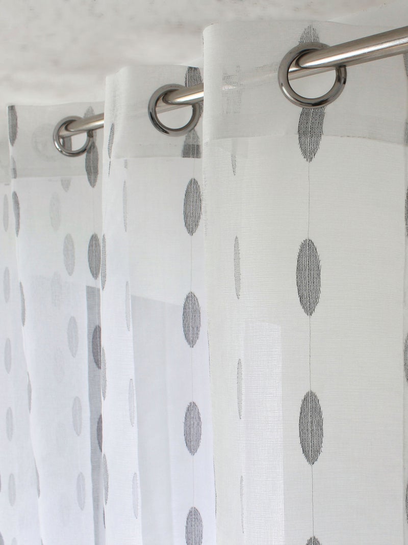 Tenda trasparente jacquard con pois ovali e occhielli Nero - Kiabi