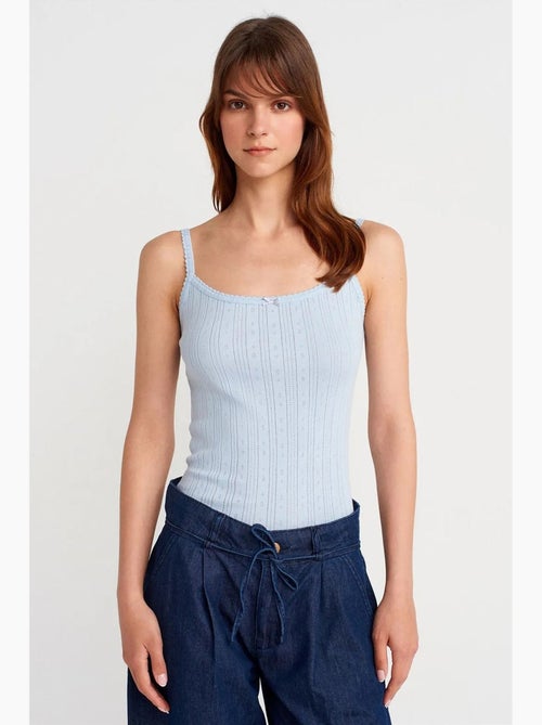 Top a canotta in cotone a coste slim fit dilvin - Kiabi Top a canotta in cotone a coste slim fit dilvin - Kiabi