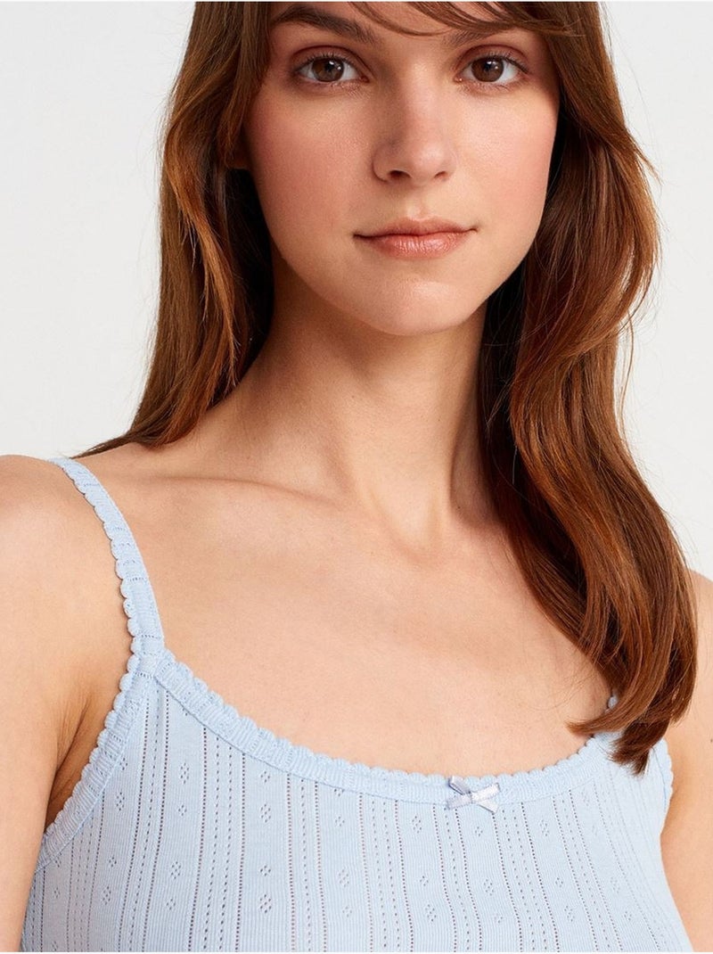 Top a canotta in cotone a coste slim fit dilvin Blu cielo - Kiabi
