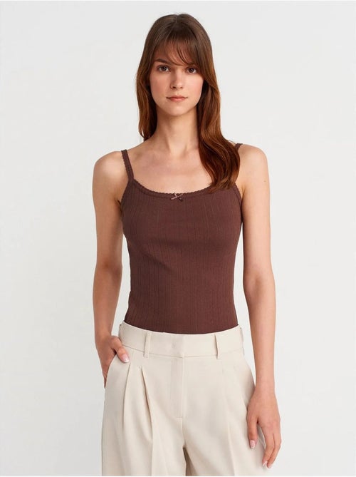 Top a canotta in cotone a coste slim fit dilvin - Kiabi Top a canotta in cotone a coste slim fit dilvin - Kiabi