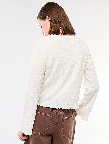 Top a collo a V in maglia goffrata con bottoni dorati