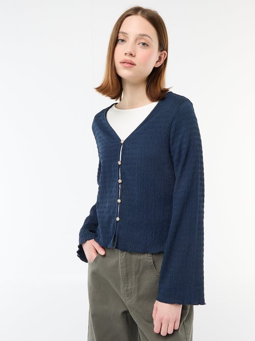 Top a collo a V in maglia goffrata con bottoni dorati - Kiabi