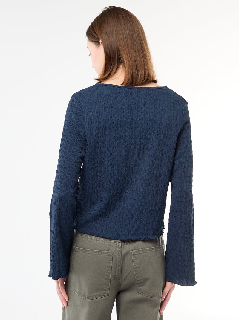 Top a collo a V in maglia goffrata con bottoni dorati Blu - Kiabi