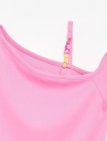 Top a costine con scollo asimmetrico
