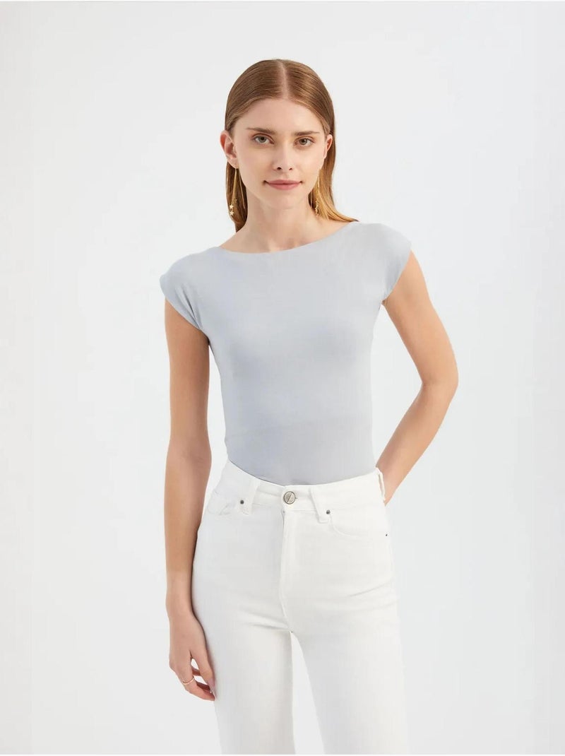 Top aderente con scollo tondo e taglio sulla schiena Grigio - Kiabi