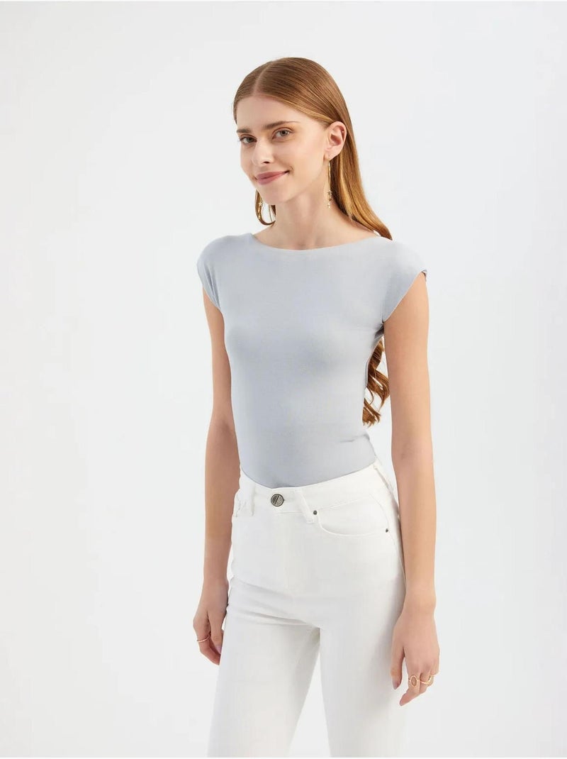 Top aderente con scollo tondo e taglio sulla schiena Grigio - Kiabi