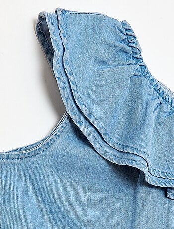 Top asimmetrico con spalline e scollo a balze