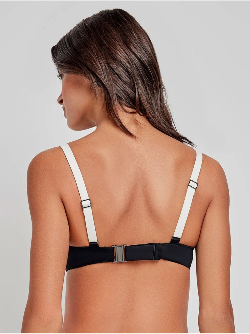 Top bikini bicolore con bordi a contrasto Nero - Kiabi