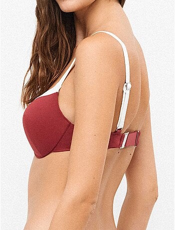 Top bikini bicolore con ferretti integrati