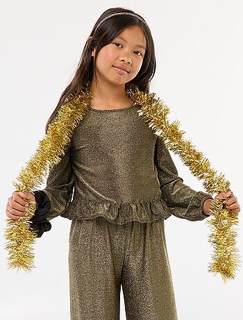 Top brillante in maglia con volant e motivo a baci