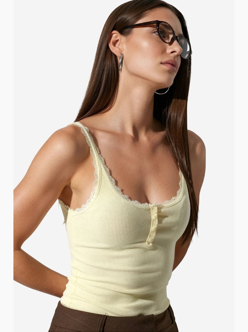 Top cami aderente con bordi in pizzo busem Giallo limone - Kiabi