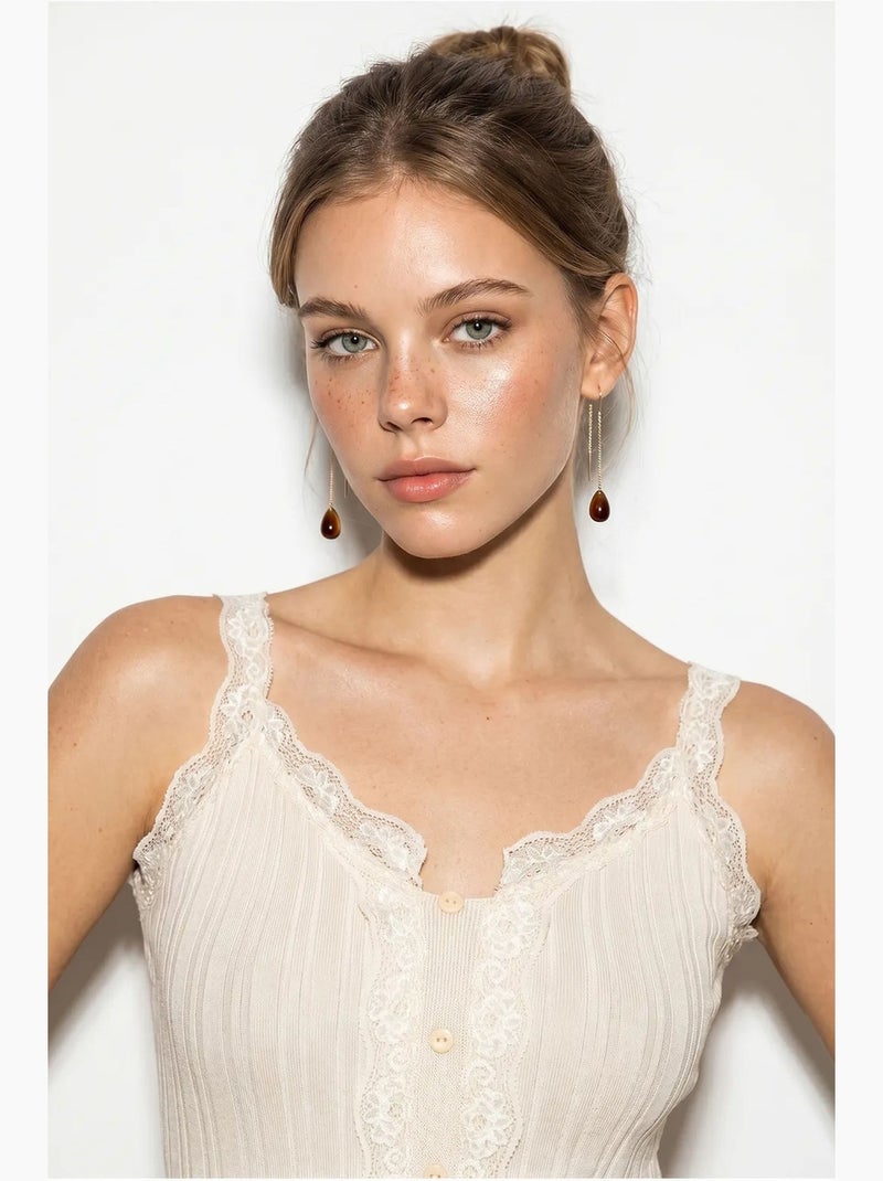 Top cami cropped aderente con bottoni lucci Crema - Kiabi