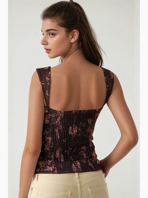 Top corto in tulle stampato con colletto a cuore hiccup - Kiabi Top corto in tulle stampato con colletto a cuore hiccup - Kiabi