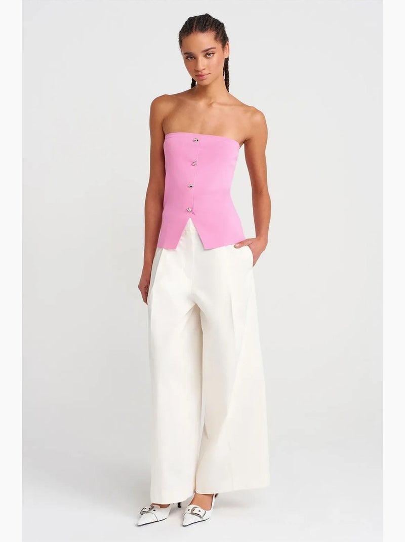 Top crop in maglia a coste senza spalline con bottoni dilvin Rosa fluo/Solinotes - Kiabi