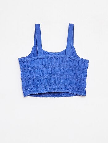 Top cropped con spalline