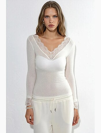 Top da donna in pizzo a maniche lunghe con scollo a v busem