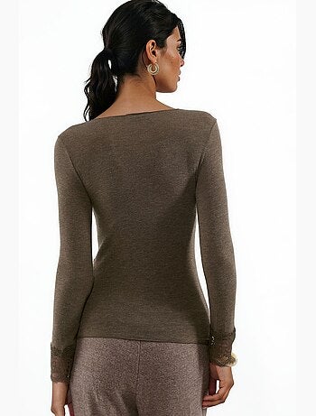 Top da donna in pizzo a maniche lunghe con scollo a v busem