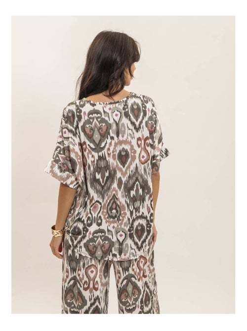 Top fluide manches courtes motifs FLORINE - Kiabi Top fluide manches courtes motifs FLORINE - Kiabi