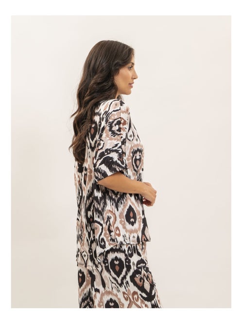 Top fluide manches courtes motifs FLORINE - Kiabi Top fluide manches courtes motifs FLORINE - Kiabi